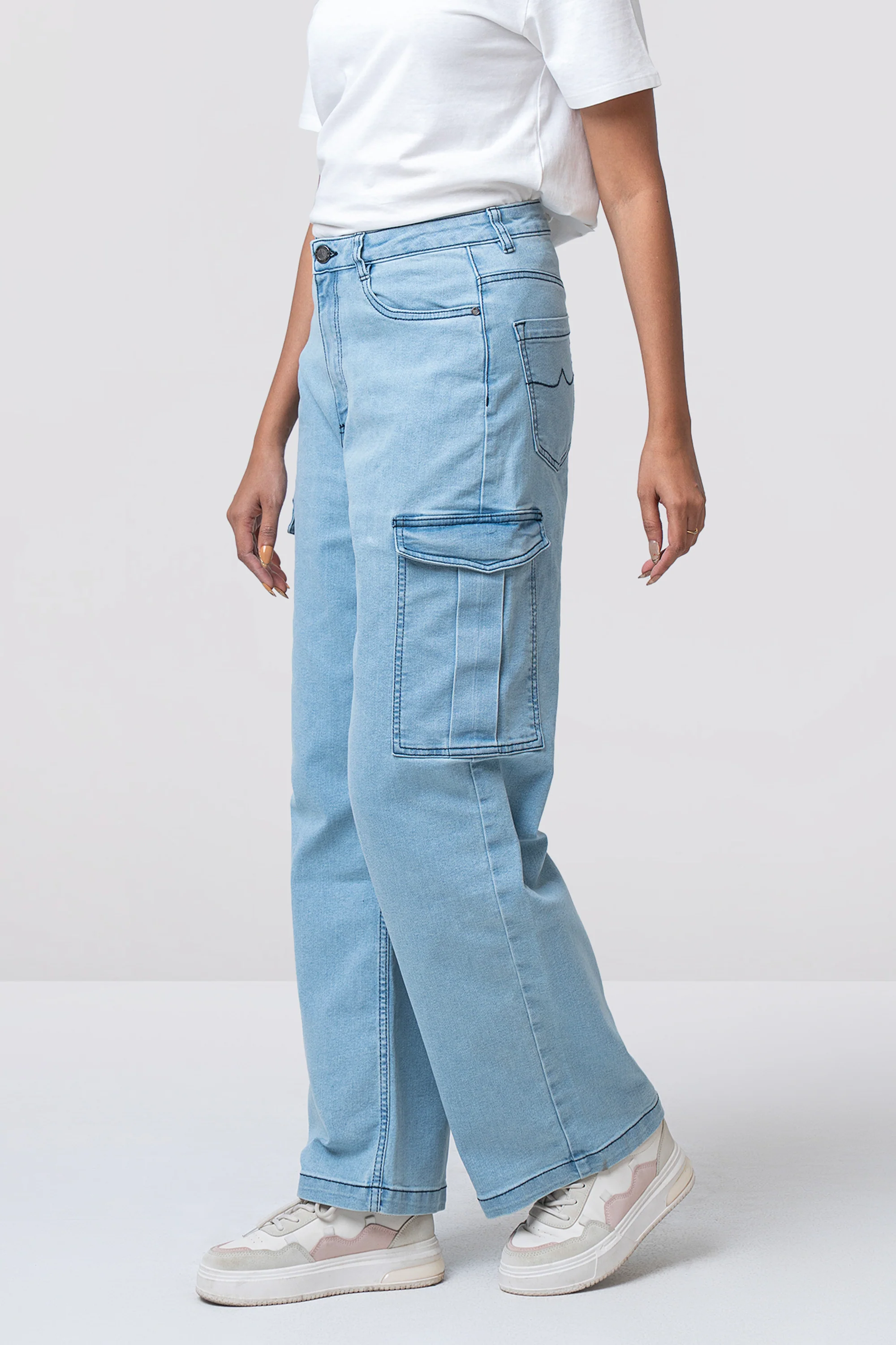 Woman wearing light blue denim pants