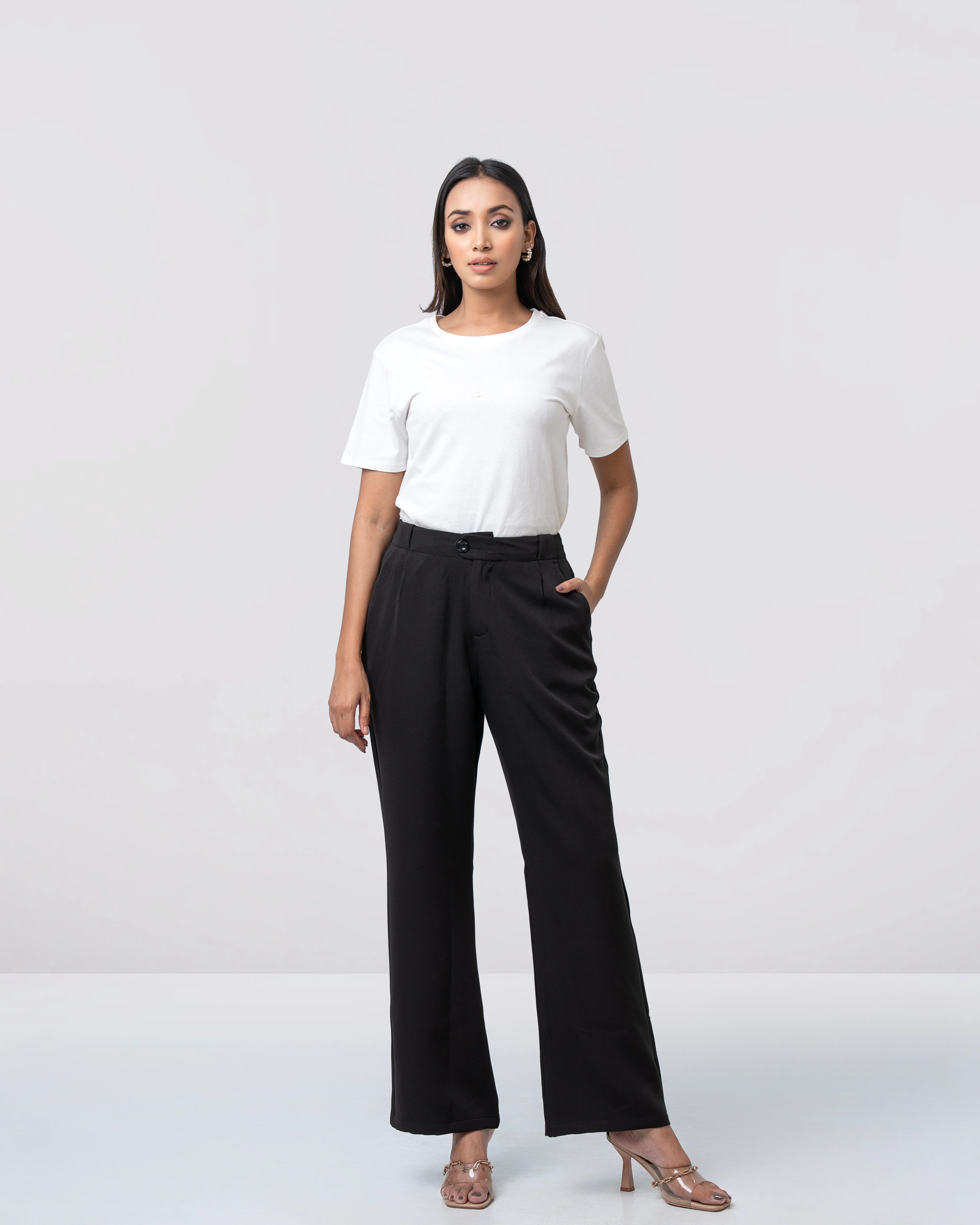 Woman wearing black twill pants
